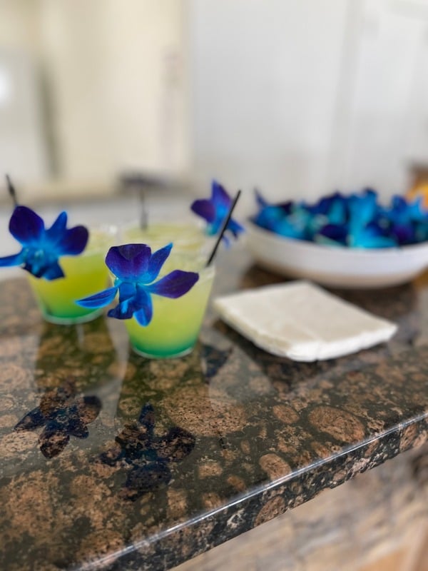 Blue floral cocktails prepared for an event